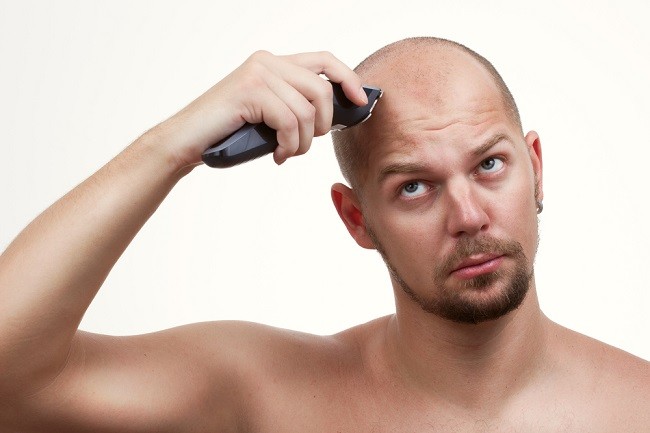 electric razor to shave head bald